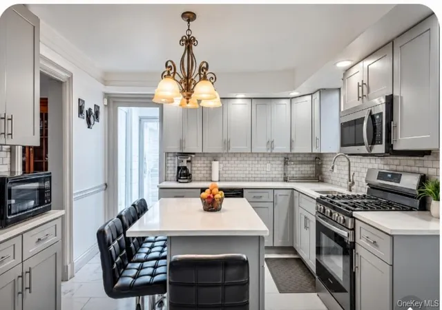 Photo 4 of Single family home for sale at 21 Harrison Ave, Hempstead, NY 11563 | MLS# 1061401 | Listing updated on 2026-10-12