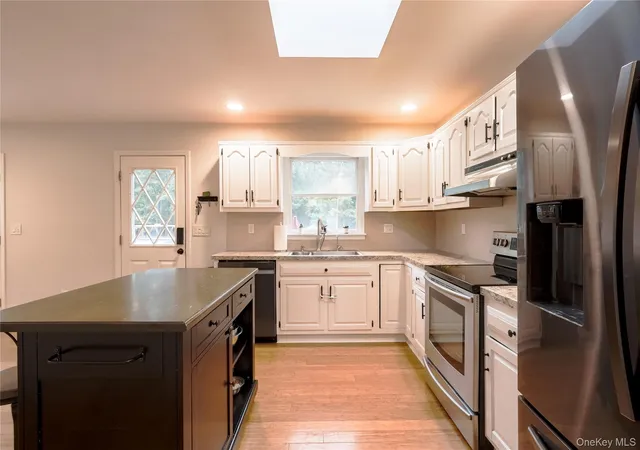 Photo 3 of Single family home for sale at 154 E Woodside Ave, Brookhaven, NY 11772 | MLS# 1062389 | Listing updated on 2026-10-29