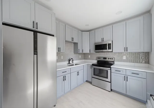 Photo 3 of Single family home for sale at 883 Hawkins Ave, Brookhaven, NY 11755 | MLS# 1063375 | Listing updated on 2026-10-22