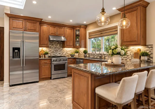 Photo 2 of Single family home for sale at 73 Beach Promenade E, Babylon, NY 11757 | MLS# 1064189 | Listing updated on 2026-10-29