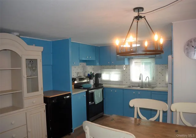 Photo 3 of Manufactured home for sale at 658 Sound Ave #E-6, Riverhead, NY 11933 | MLS# 1064305 | Listing updated on 2026-10-29