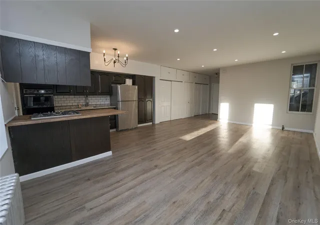 Photo 2 of Multi family home for sale at 7150 68th Street, New York, NY 11385 | MLS# 1064468 | Listing updated on 2026-10-27
