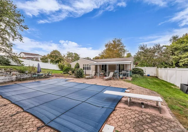 Photo 2 of Single family home for sale at 100 Ridgewood Ave, Brookhaven, NY 11742 | MLS# 1064873 | Listing updated on 2026-10-25