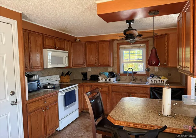 Photo 2 of Single family home for sale at 109 8th Avenue, Brookhaven, NY 11742 | MLS# 1064969 | Listing updated on 2026-10-29