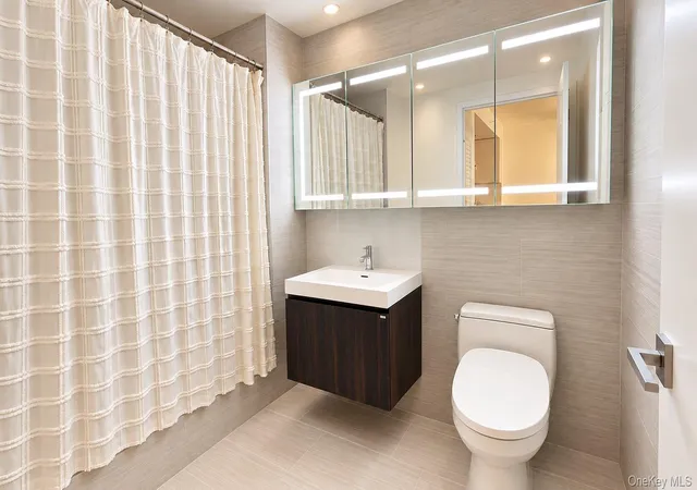 Listing Photo 1 - Condo for sale in building located at 131-01 40th Rd, New York, NY 11354 - Unit #18C
