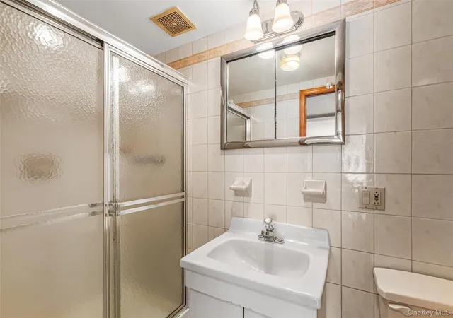 Photo 3 of Single family home for sale at 14721 10th Avenue, New York, NY 11357 | MLS# 1065733 | Listing updated on 2026-10-23