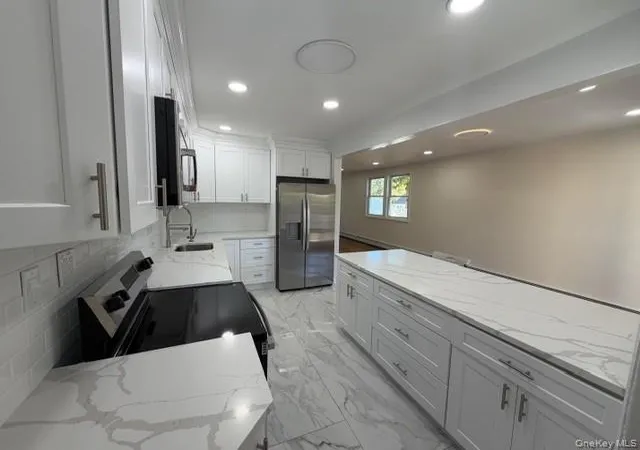 Photo 4 of Single family home for sale at 42 Gould Rd, Brookhaven, NY 11720 | MLS# 1066311 | Listing updated on 2026-10-27