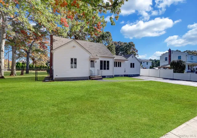 Photo 4 of Single family home for sale at 203 Carroll Ave, Brookhaven, NY 11779 | MLS# 1066465 | Listing updated on 2026-10-29