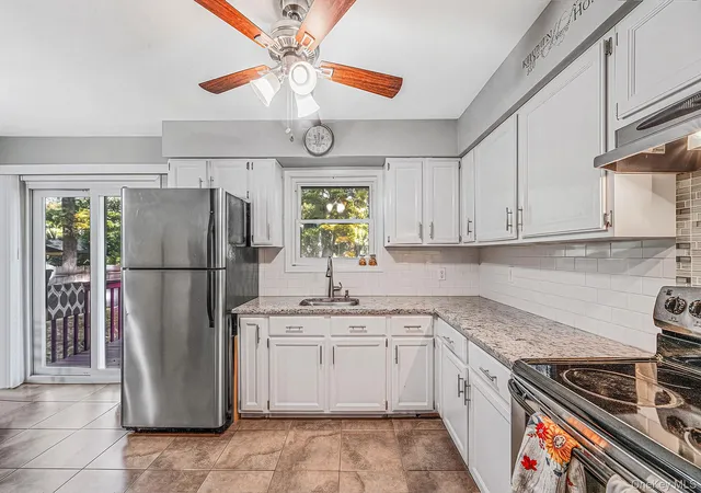 Photo 4 of Single family home for sale at 77 Wilson Ave, Brookhaven, NY 11763 | MLS# 1066632 | Listing updated on 2026-10-27