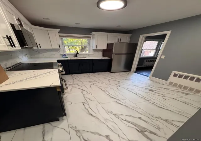 Photo 4 of Single family home for sale at 104 Phoenix St, Hempstead, NY 11550 | MLS# 1066937 | Listing updated on 2026-10-29