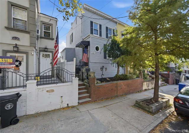 Single family home for sale at 6618 Jay Ave, New York, NY 11378 | MLS# 1067054