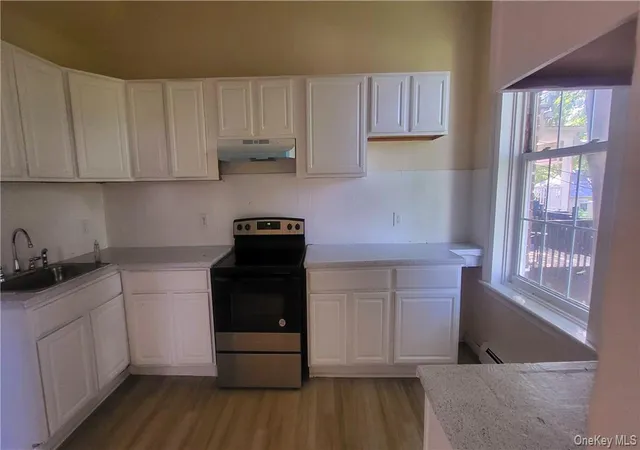 Photo 2 of Single family home for sale at 100 Academy St, Poughkeepsie, NY 12601 | MLS# 1067669 | Listing updated on 2026-10-29
