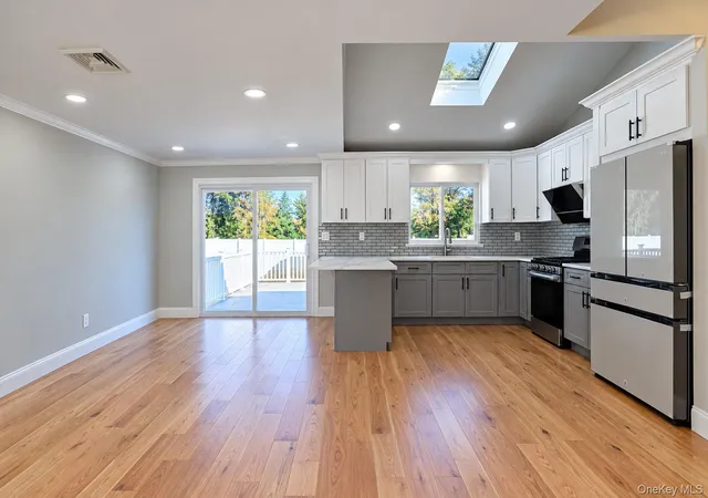 Photo 2 of Single family home for sale at 201 Martin Dr, Oyster Bay, NY 11791 | MLS# 1068085 | Listing updated on 2026-10-29