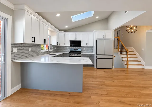 Photo 3 of Single family home for sale at 201 Martin Dr, Oyster Bay, NY 11791 | MLS# 1068085 | Listing updated on 2026-10-29