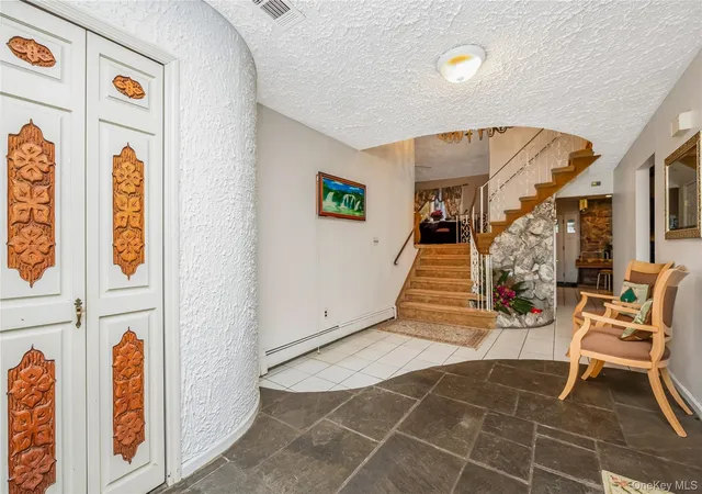 Photo 3 of Single family home for sale at 7 Edgewood Ave, Smithtown, NY 11787 | MLS# 1068186 | Listing updated on 2026-10-29