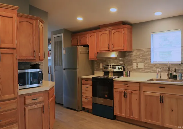 Photo 3 of Manufactured home for sale at 1411 W Walnut St, Washington, IN 47501 | MLS# 202626095 | Listing updated on 2026-09-10
