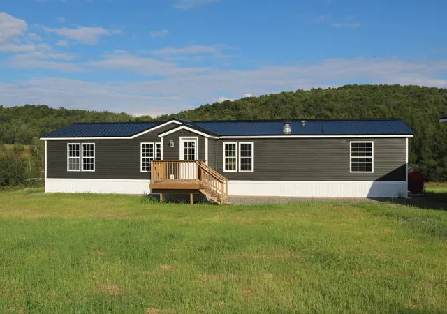 Photo 2 of Manufactured home for sale at 1056 Swamp Rd, Enosburg Falls, VT 05450 | MLS# 5077218 | Listing updated on 2026-09-16