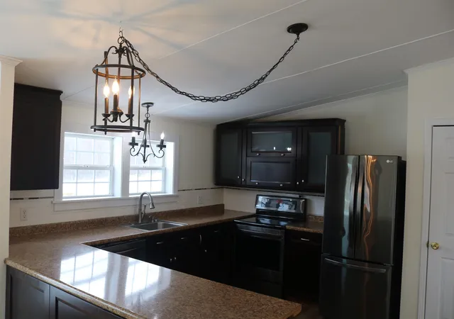 Photo 4 of Manufactured home for sale at 1056 Swamp Rd, Enosburg Falls, VT 05450 | MLS# 5077218 | Listing updated on 2026-09-30