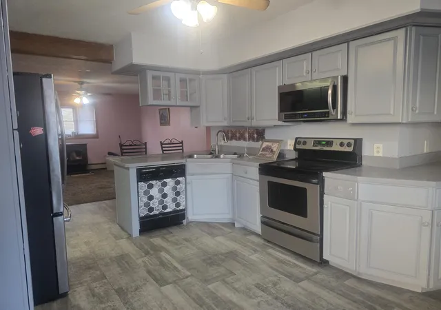 Photo 3 of Multi family home for sale at 41 Main St, Allenstown, NH 03275 | MLS# 5079789 | Listing updated on 2026-06-11