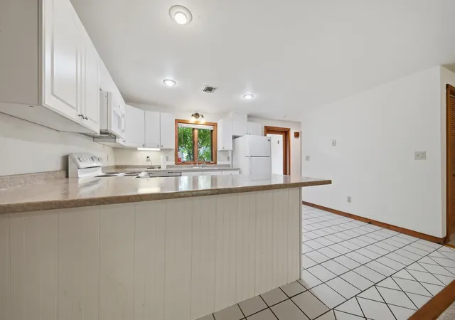 Photo 4 of Townhouse for sale at 13 Hampton Towne Ests, Hampton, NH 03842 | MLS# 5095204 | Listing updated on 2026-06-25