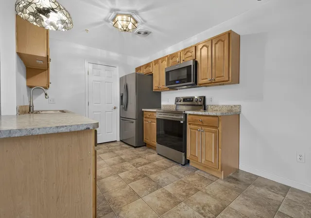Photo 3 of Condo for sale at 65 Fordway Ext Blvd #202, Derry, NH 03038 | MLS# 5096491 | Listing updated on 2026-06-30