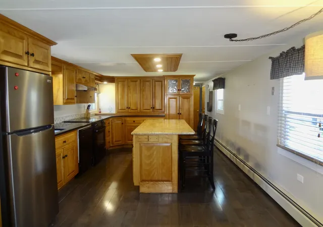 Photo 3 of Manufactured home for sale at 303 Old Lakeshore Rd #B-4, Gilford, NH 03249 | MLS# 5099771 | Listing updated on 2026-07-15