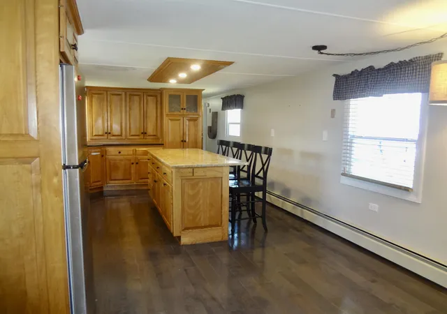 Photo 3 of Manufactured home for sale at 303 Old Lakeshore Rd #B-4, Gilford, NH 03249 | MLS# 5099771 | Listing updated on 2026-07-15