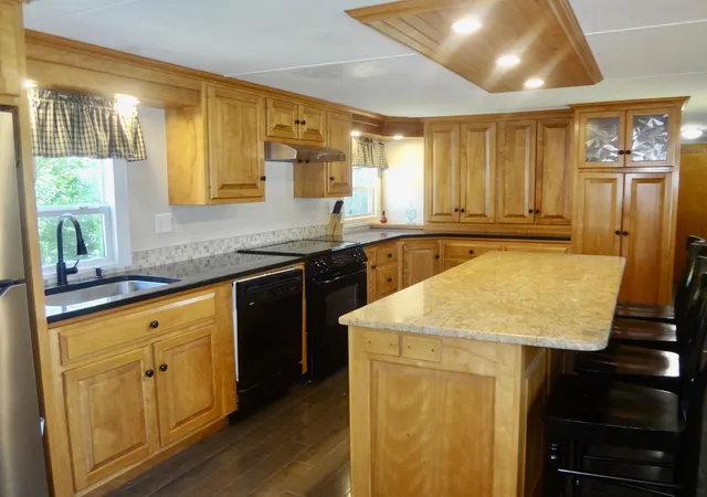 Photo 4 of Manufactured home for sale at 303 Old Lakeshore Rd #B-4, Gilford, NH 03249 | MLS# 5099771 | Listing updated on 2026-07-15