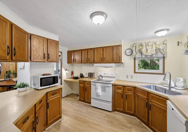 Photo 3 of Manufactured home for sale at 46 Edgewood Dr, Contoocook, NH 03229 | MLS# 5100027 | Listing updated on 2026-07-29
