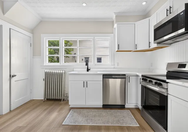 Photo 3 of Single family home for sale at 383 Wilson St, Manchester, NH 03103 | MLS# 5100058 | Listing updated on 2026-09-11