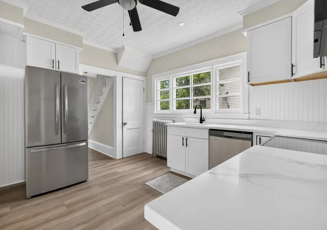 Photo 4 of Single family home for sale at 383 Wilson St, Manchester, NH 03103 | MLS# 5100058 | Listing updated on 2026-09-11