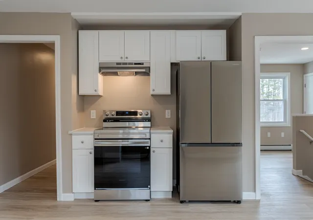 Photo 4 of Multi family home for sale at 60 Charles St, Farmington, NH 03835 | MLS# 5100435 | Listing updated on 2026-07-17