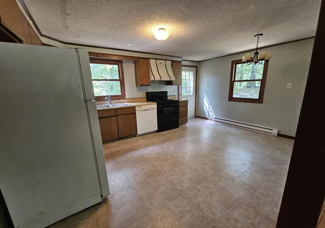Photo 3 of Multi family home for sale at 94 Wason Rd, Hudson, NH 03051 | MLS# 5100474 | Listing updated on 2026-07-29
