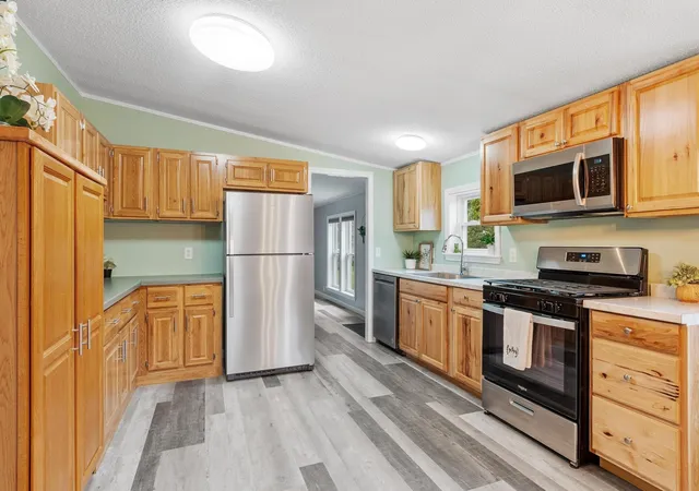 Photo 3 of Manufactured home for sale at 26 Country Ln, Fremont, NH 03044 | MLS# 5101189 | Listing updated on 2026-07-26