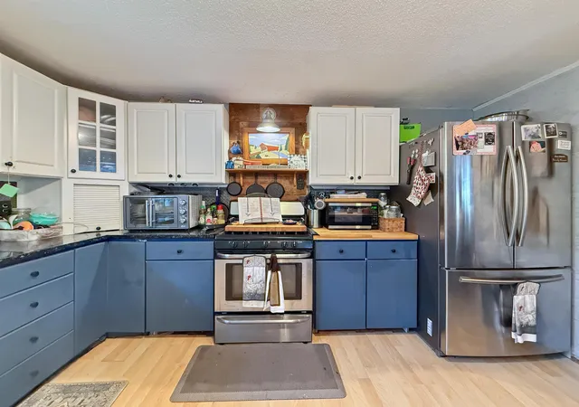 Photo 4 of Single family home for sale at 215 Mill Brook Rd, Bloomfield, VT 05905 | MLS# 5101655 | Listing updated on 2026-07-28