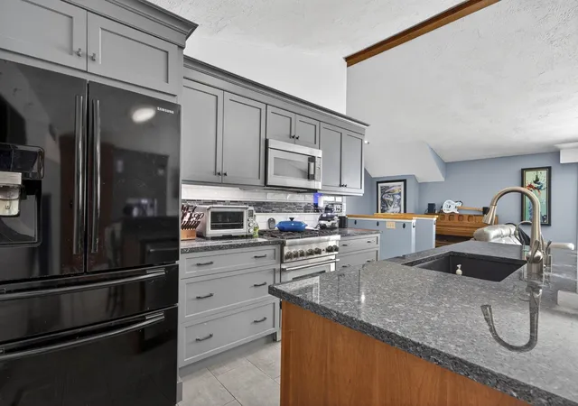 Photo 3 of Single family home for sale at 49 Birkdale Rd, Bedford, NH 03110 | MLS# 5103514 | Listing updated on 2026-09-16