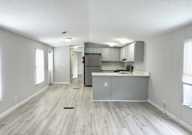 Photo 3 of Manufactured home for sale at 16 Bradford Dr, Litchfield, NH 03052 | MLS# 5104446 | Listing updated on 2026-10-07