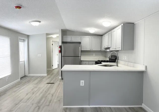 Photo 4 of Manufactured home for sale at 16 Bradford Dr, Litchfield, NH 03052 | MLS# 5104446 | Listing updated on 2026-10-07
