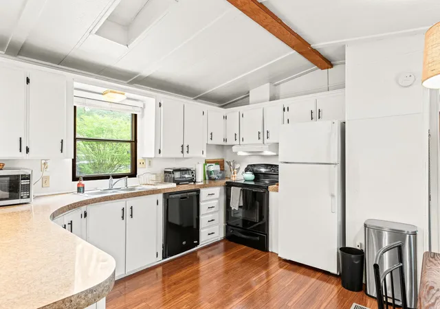 Photo 2 of Manufactured home for sale at 16 N Dewberry Ln, Rochester, NH 03867 | MLS# 5105626 | Listing updated on 2026-08-21
