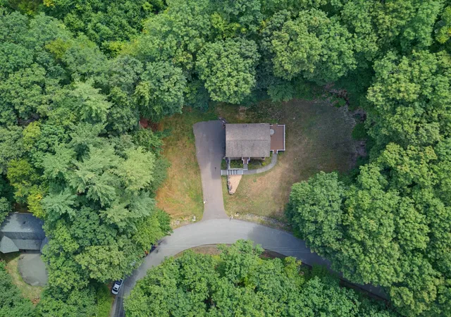 Photo 2 of Single family home for sale at 57 Greenleaf Trl, Gilford, NH 03249 | MLS# 5106096 | Listing updated on 2026-09-01