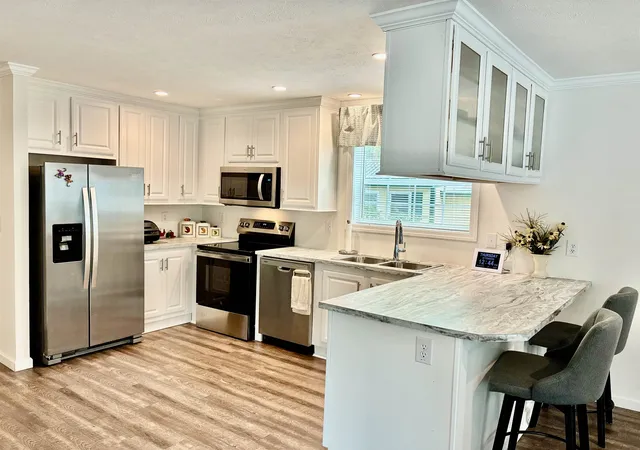 Photo 3 of Single family home for sale at 14 Flamingo Dr, Concord, NH 03303 | MLS# 5107476 | Listing updated on 2026-09-14