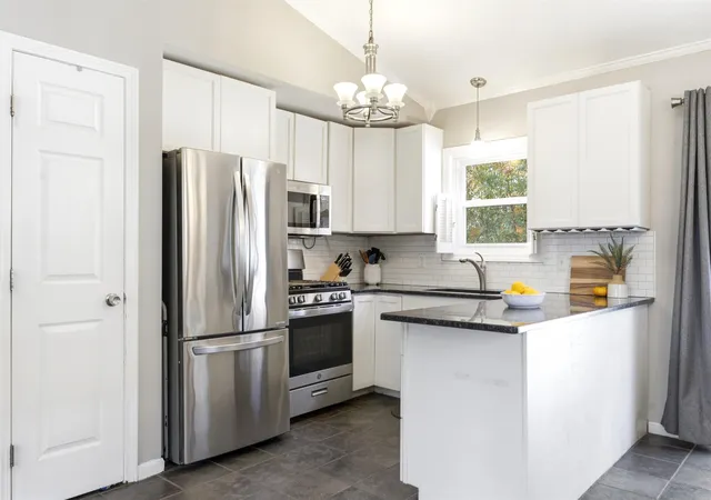 Photo 4 of Single family home for sale at 67 Gantry St, Manchester, NH 03103 | MLS# 5116118 | Listing updated on 2026-10-31