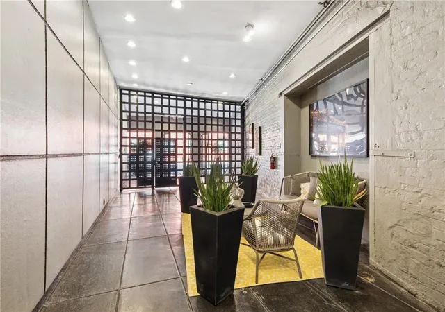 Listing Photo 1 - Condo for sale in building located at 448 Julia St, New Orleans, LA 70130 - Unit #314