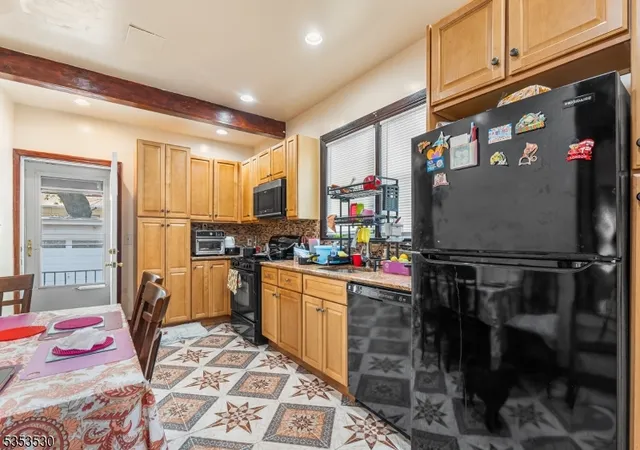 Photo 2 of Single family home for sale at 11 North 21st St, East Orange, NJ 07017 | MLS# 3960300 | Listing updated on 2025-08-26