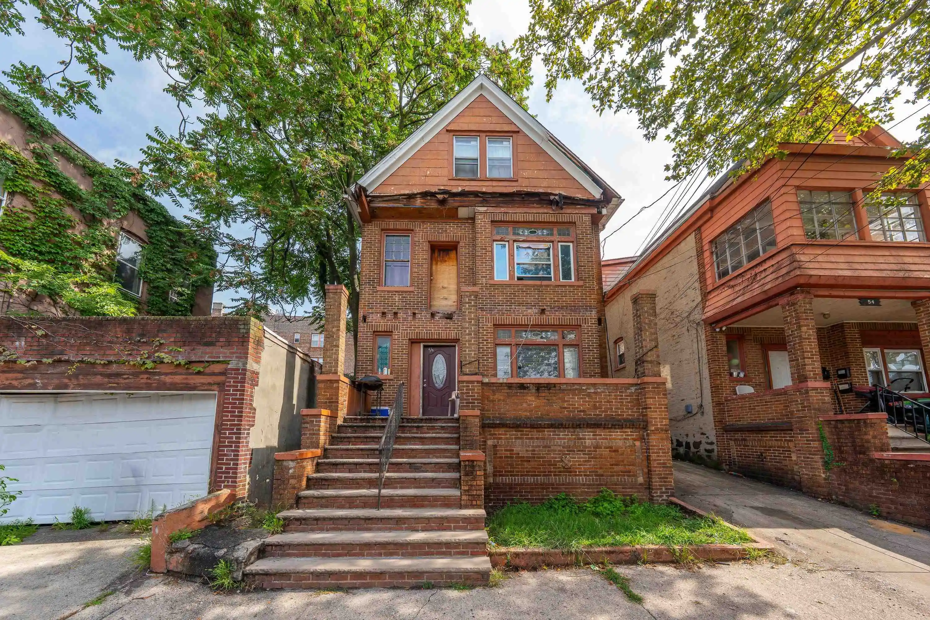 Photo 1 of Multi family home for sale at 56 Wade St, Jersey City, NJ 07305 | MLS# 260019541 | Listing updated on 2026-10-05
