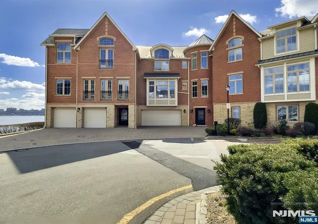 Townhouse for sale at 25 Moorings Ln, Edgewater, NJ 07020 | MLS# 26007924