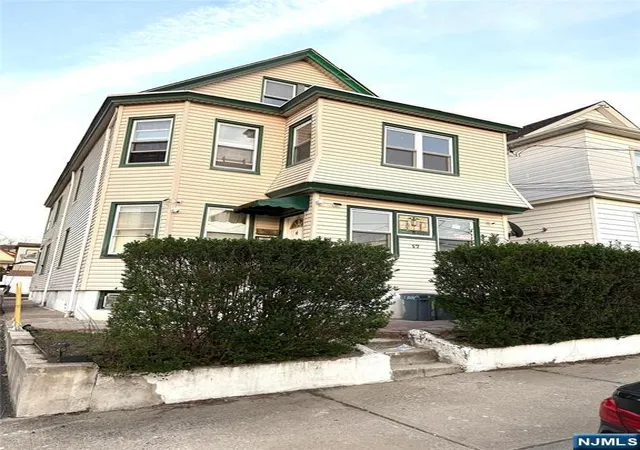 Photo 2 of Multi family home for sale at 17 Quinn St, Paterson, NJ 07501 | MLS# 26014033 | Listing updated on 2026-05-07