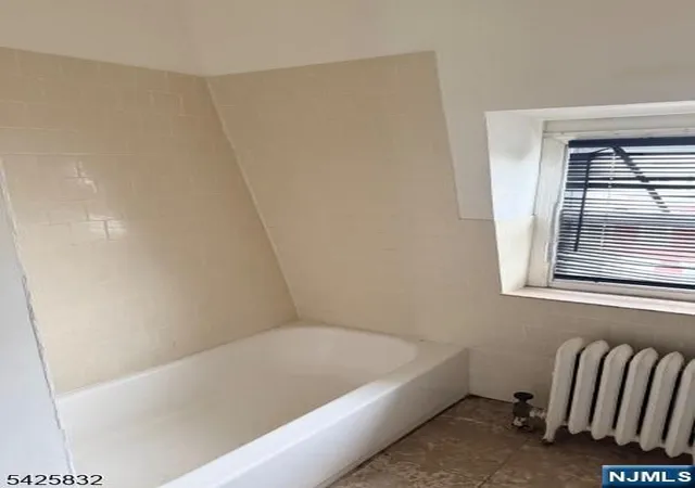 Photo 4 of Single family home for sale at 38 Emmet St, Newark, NJ 07114 | MLS# 26015005 | Listing updated on 2026-04-28