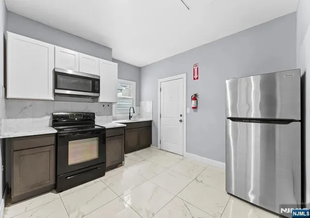 Photo 3 of Multi family home for sale at 101 Lafayette, Paterson, NJ 07501 | MLS# 26018427 | Listing updated on 2026-09-19