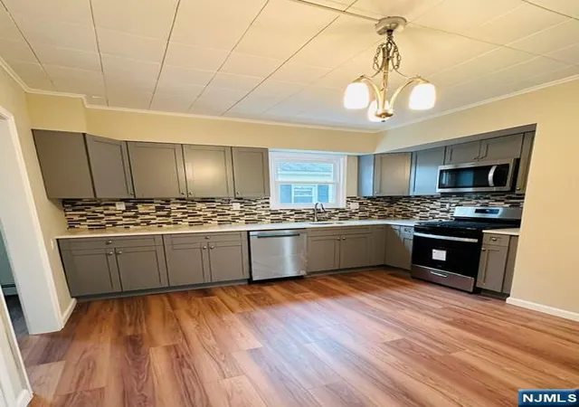 Photo 3 of Single family home for sale at 1 Woodside Ave, Little Falls, NJ 07424 | MLS# 26020433 | Listing updated on 2026-08-28